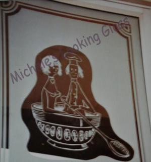 Logo etched for restaurant door: close up