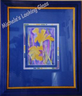 Two hand finished frames, two matboards and middle matboard hand created to echo colours in painting